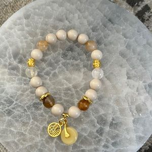 Handcrafted bracelet with fu charm for good luck